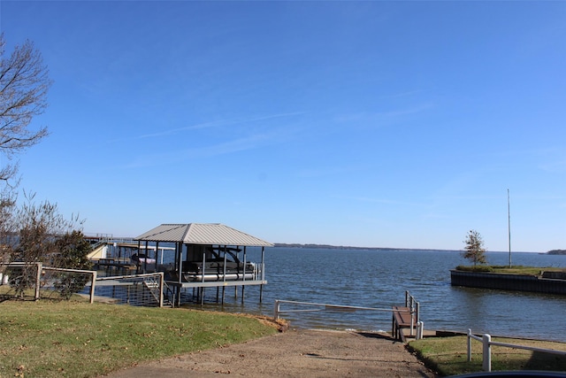 dock area with a water view