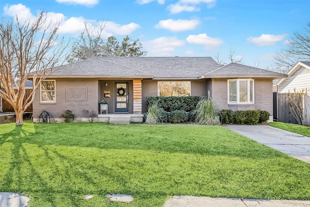 ranch-style house with a front yard