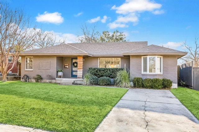 ranch-style house with a front lawn