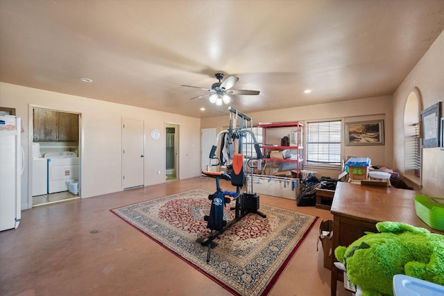 interior space with ceiling fan and washer / clothes dryer