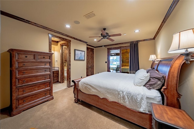 carpeted bedroom featuring ornamental molding and ceiling fan