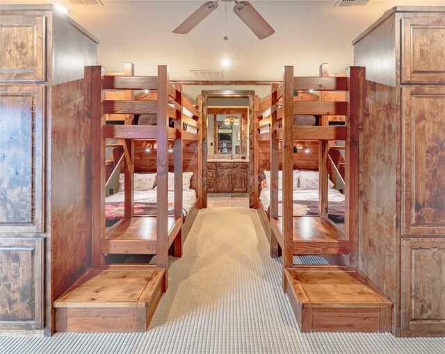 bedroom featuring light carpet and ornamental molding