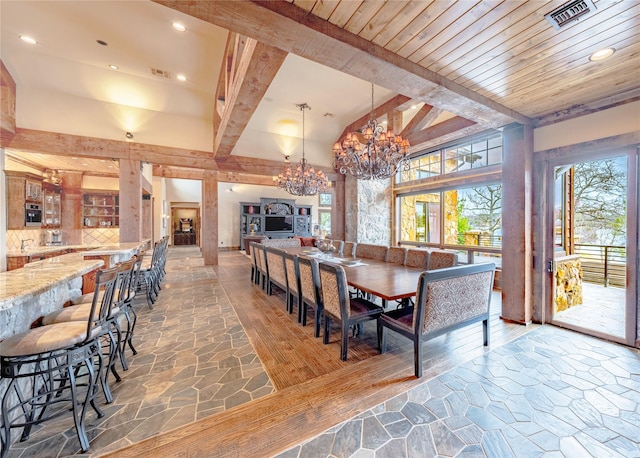 dining space featuring a notable chandelier