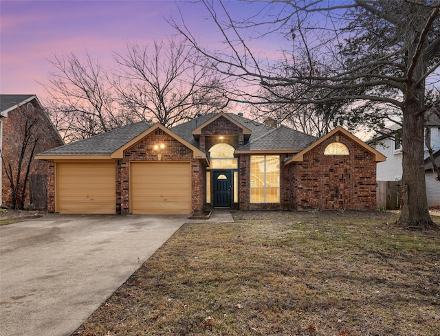 ranch-style home with a garage