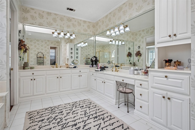 bathroom featuring tile patterned floors, vanity, and a shower with shower door