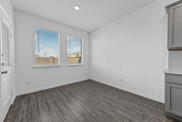 interior space with dark hardwood / wood-style flooring