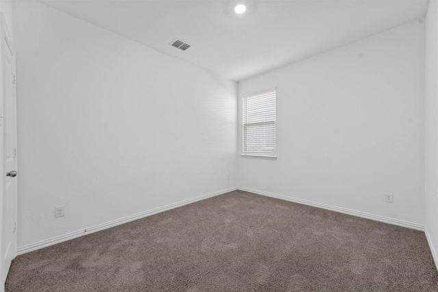 unfurnished room featuring carpet floors