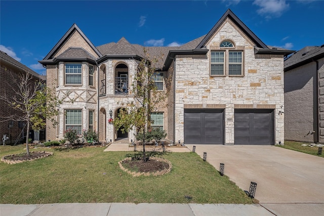 french provincial home featuring a garage, a front yard, and central air condition unit