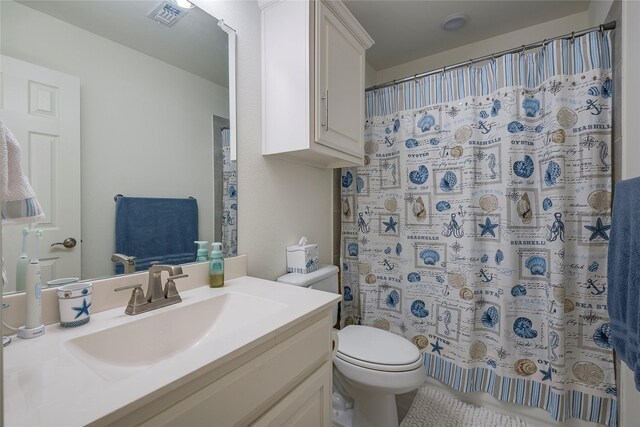 509 Christie Xing, Celina, TX 75009 - bathroom with vanity, walk in shower, and toilet