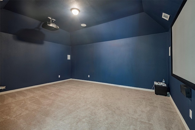 509 Christie Xing, Celina, TX 75009 - cinema room featuring lofted ceiling, carpet flooring, and a textured ceiling