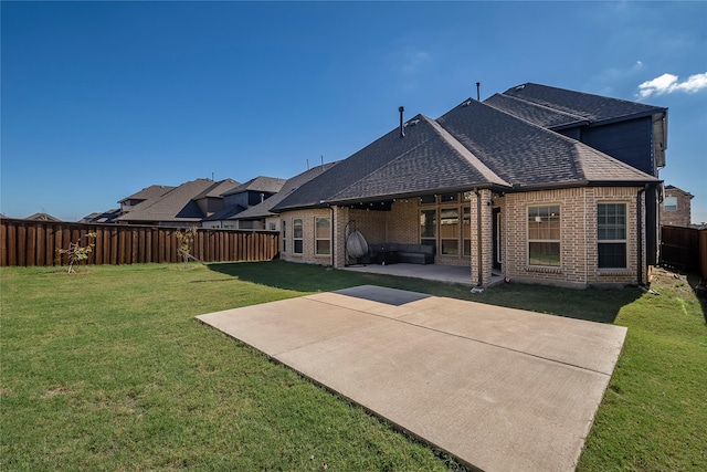509 Christie Xing, Celina, TX 75009 - rear view of property with a lawn and a patio area