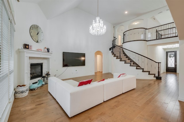 509 Christie Xing, Celina, TX 75009 - living room featuring light wood-type flooring and high vaulted ceiling