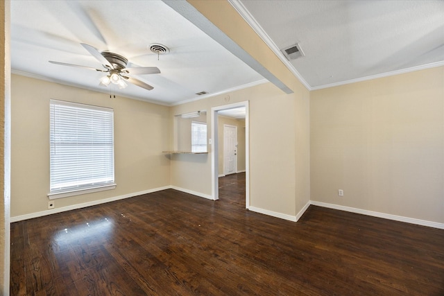 unfurnished room with ornamental molding, ceiling fan, and dark hardwood / wood-style flooring