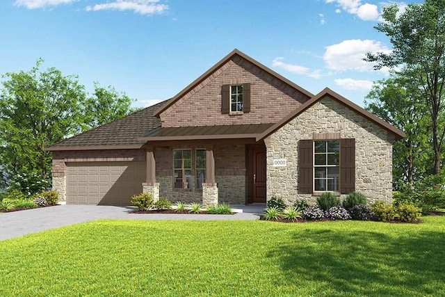 view of front of house with a garage and a front yard