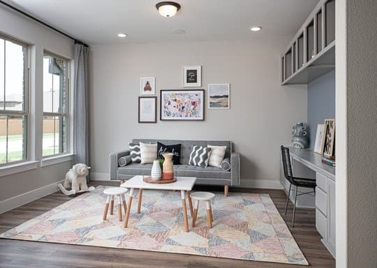 living room featuring built in desk, dark wood-type flooring, and a wealth of natural light