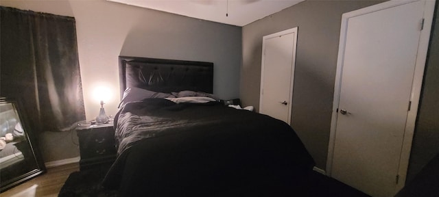 bedroom with light hardwood / wood-style floors