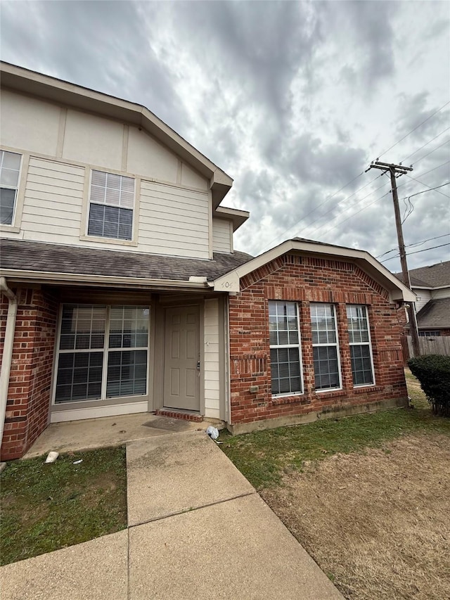 view of front of house with a patio area