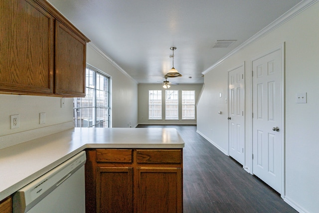 kitchen featuring pendant lighting, light countertops, brown cabinetry, ornamental molding, and dishwasher