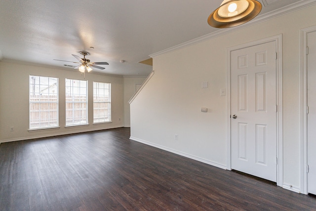 unfurnished living room featuring ceiling fan, baseboards, dark wood-type flooring, and crown molding