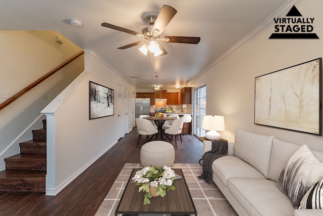 living area with ornamental molding, dark wood-style flooring, stairway, and baseboards