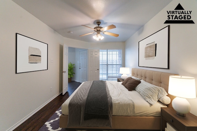 bedroom featuring a ceiling fan, baseboards, and dark wood-style flooring