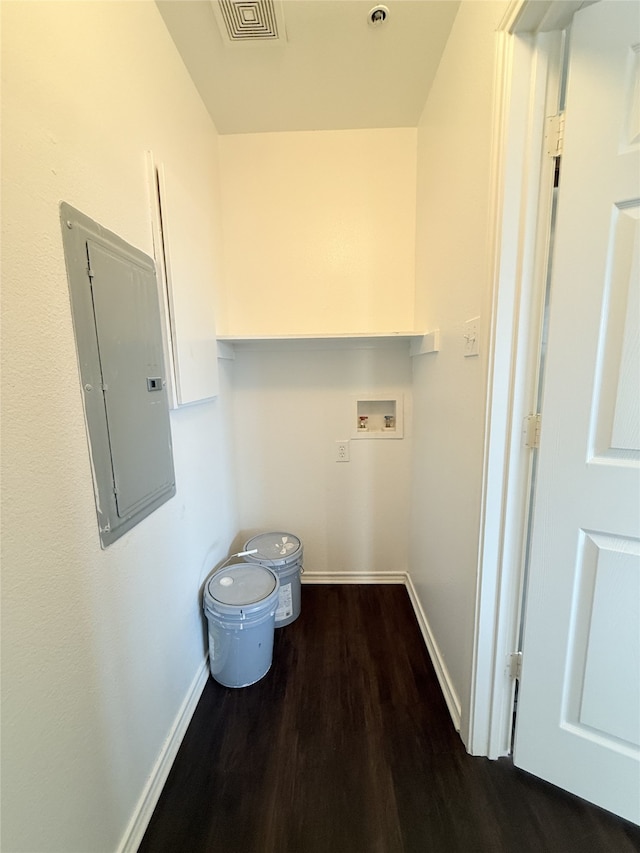 laundry room with washer hookup, dark hardwood / wood-style flooring, and electric panel