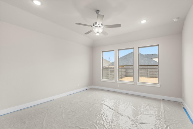 unfurnished room with baseboards, a ceiling fan, and recessed lighting