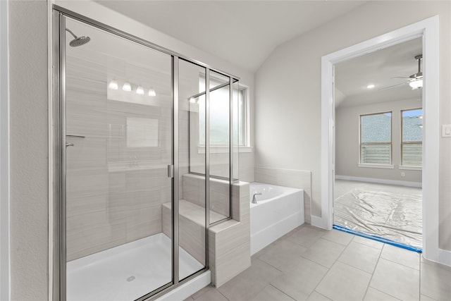 full bath featuring tile patterned flooring, a ceiling fan, baseboards, a bath, and a stall shower