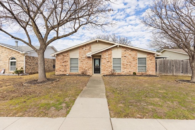 view of front of home with a front lawn