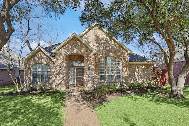 view of front of house with a front lawn