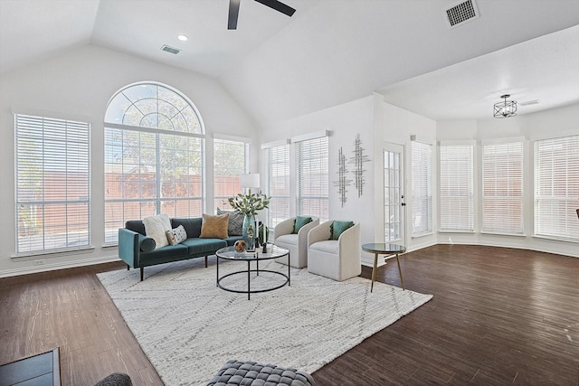 living room featuring lofted ceiling, hardwood / wood-style flooring, a wealth of natural light, and ceiling fan