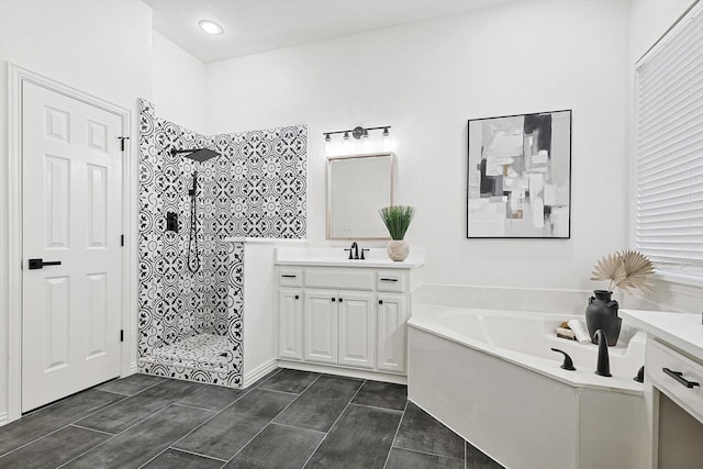 bathroom featuring vanity, tile patterned flooring, and independent shower and bath