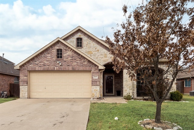 view of front facade featuring a garage and a front yard