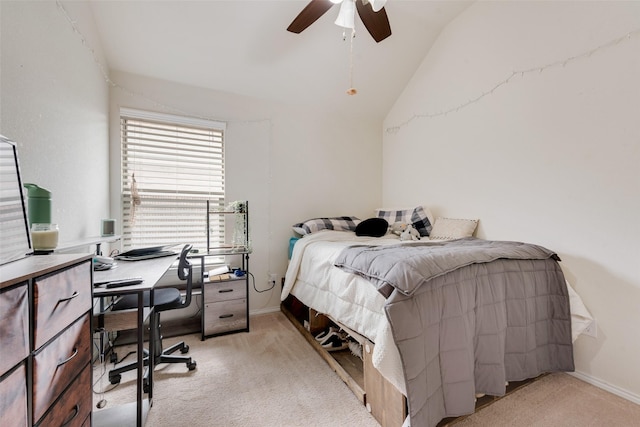 carpeted bedroom with lofted ceiling and ceiling fan