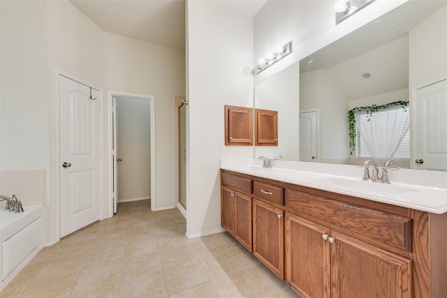 bathroom with vanity and a bathtub