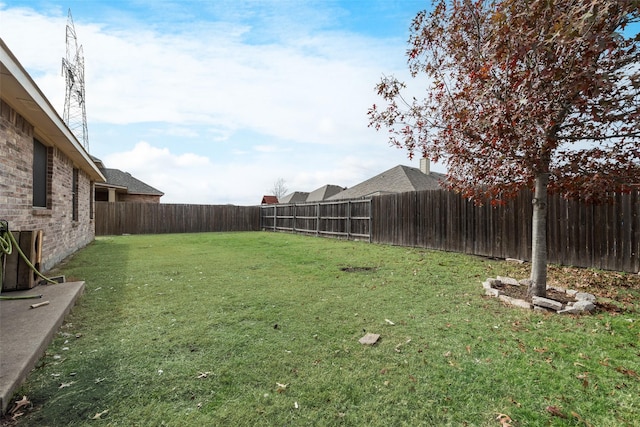 view of yard with central AC