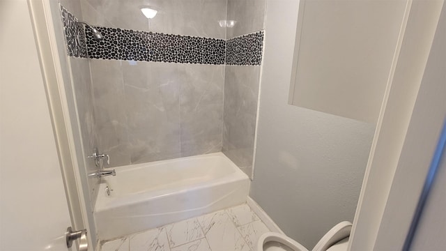 bathroom with shower / bathtub combination