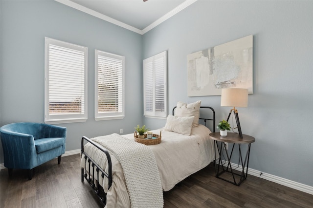 bedroom with crown molding and dark wood-type flooring