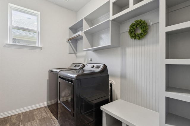 laundry area with washing machine and clothes dryer