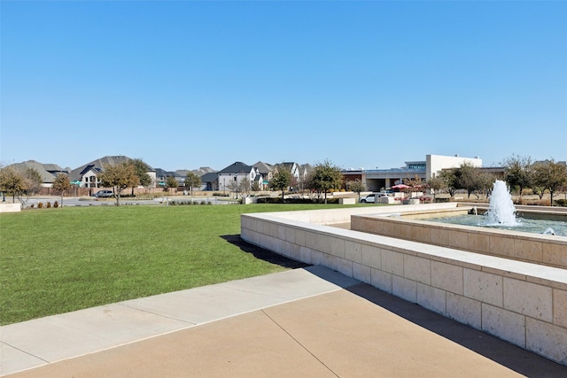 surrounding community featuring a lawn