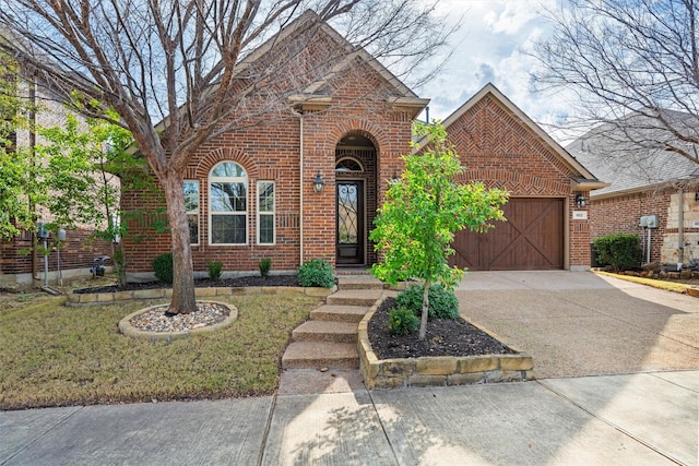 view of front property with a garage and a front yard