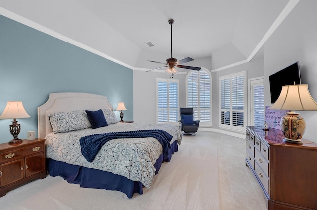 bedroom featuring ceiling fan, ornamental molding, and lofted ceiling