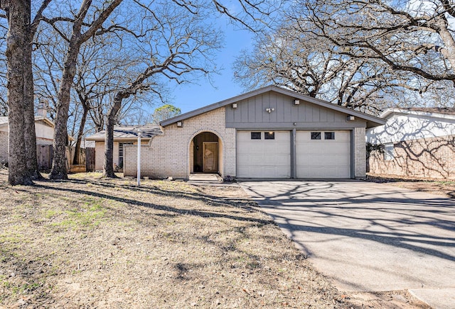 single story home with a garage