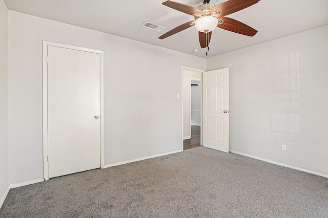 interior space with ceiling fan