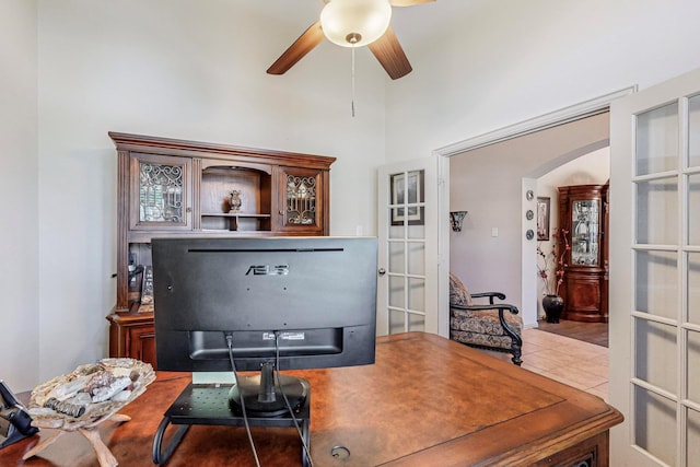 office area with tile patterned flooring, french doors, and ceiling fan