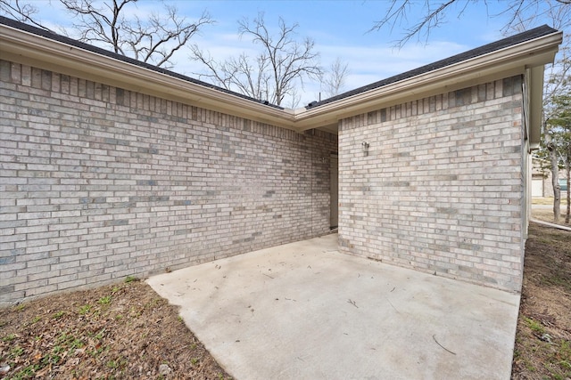 doorway to property with a patio