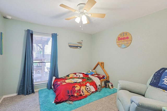 carpeted bedroom featuring ceiling fan