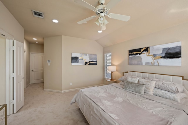 bedroom featuring ceiling fan, lofted ceiling, and light carpet