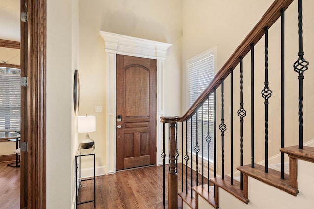 foyer entrance featuring dark hardwood / wood-style flooring