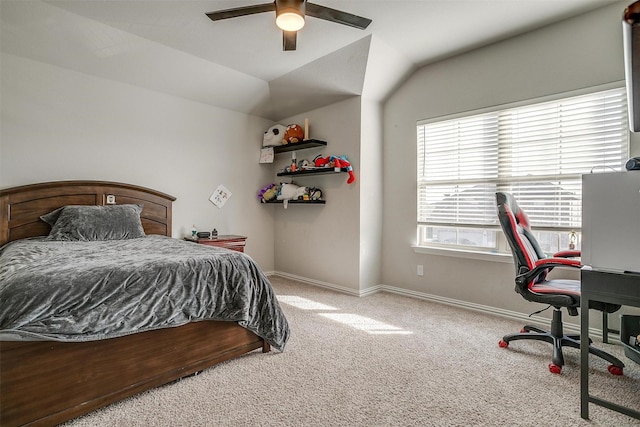 bedroom featuring lofted ceiling, light carpet, and ceiling fan